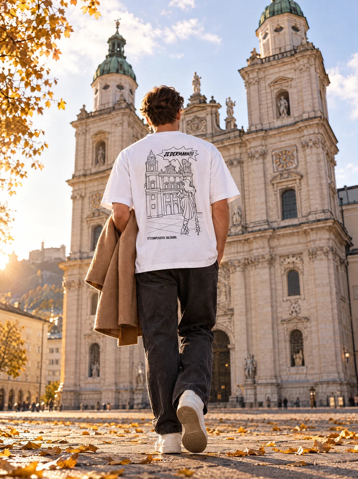 Jedermann T-shirt by Posh Alley Cats in front of Salzburg Cathedral in autumn